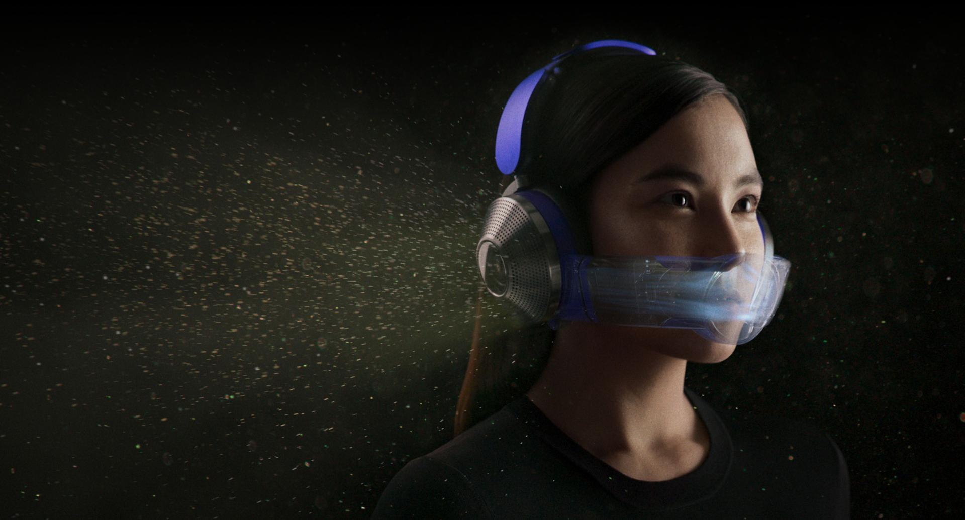 Woman wearing Dyson Zone headphones with air purification.
