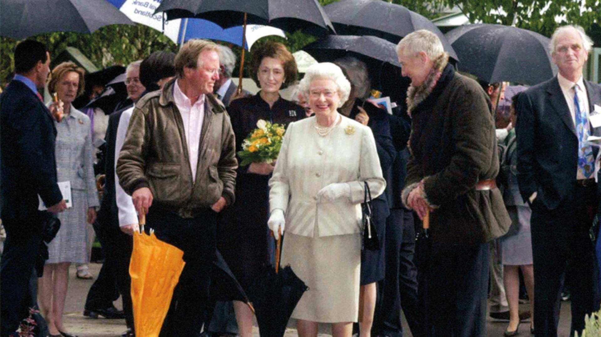 Queen Elizabeth II at The Chelsea Flower Show with James Dyson and Charles Moore