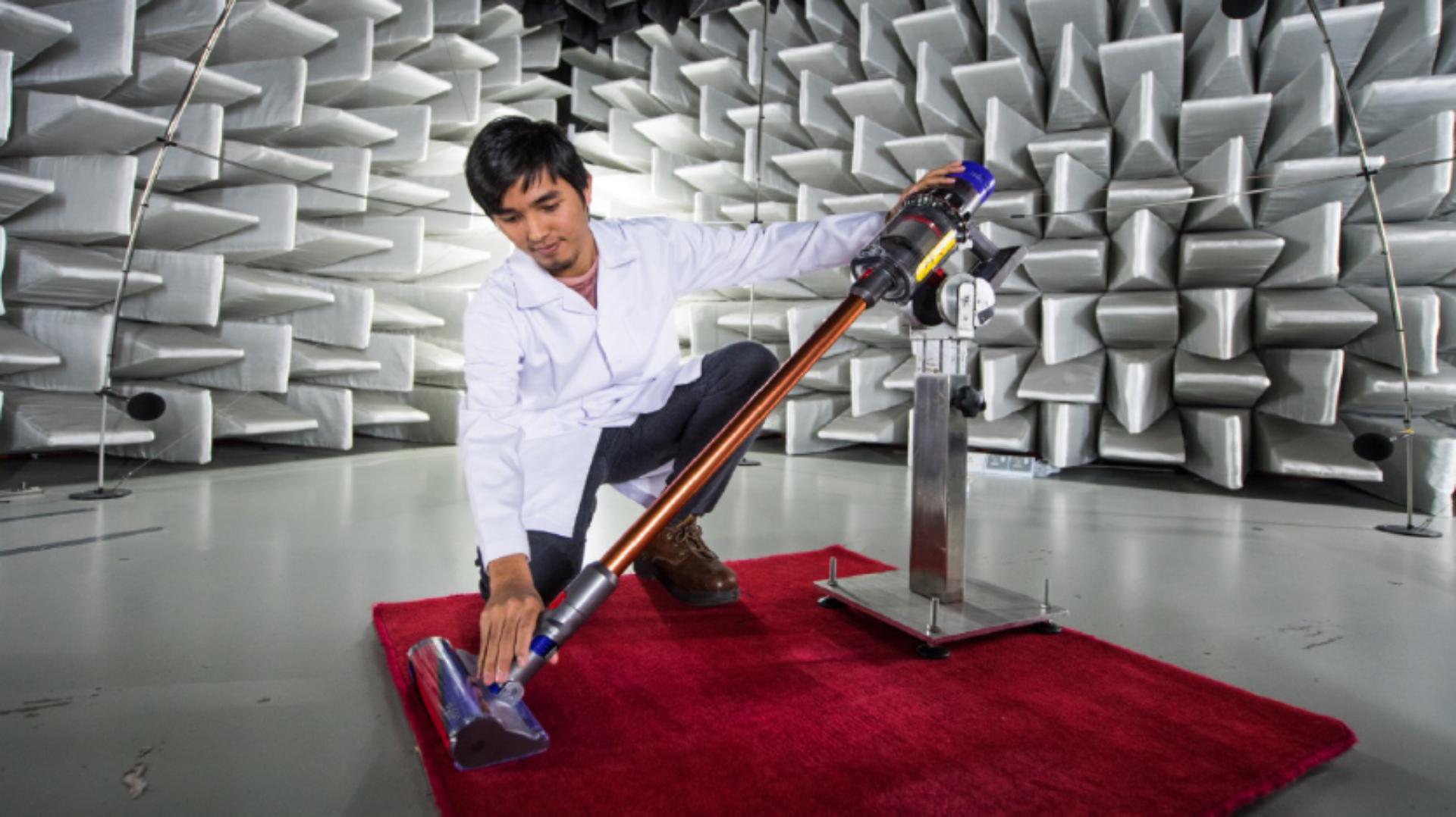 A lab engineer tests a Dyson V15 in a semi anechoic chamber in Malaysia