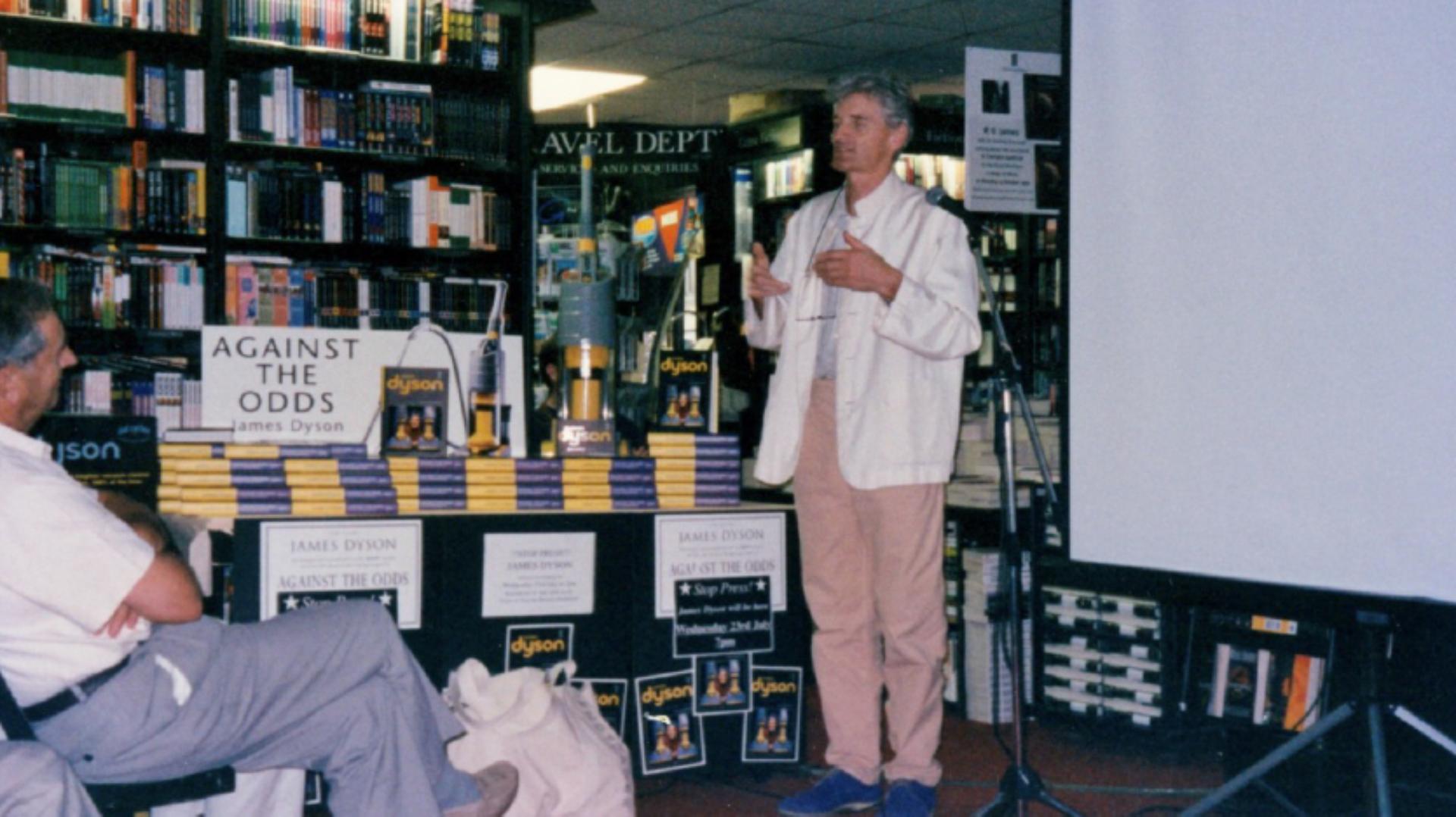 James Dyson standing in a book store