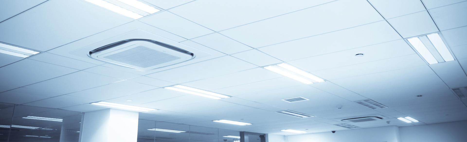 Inefficient, costly fluorescent bulbs on office ceiling