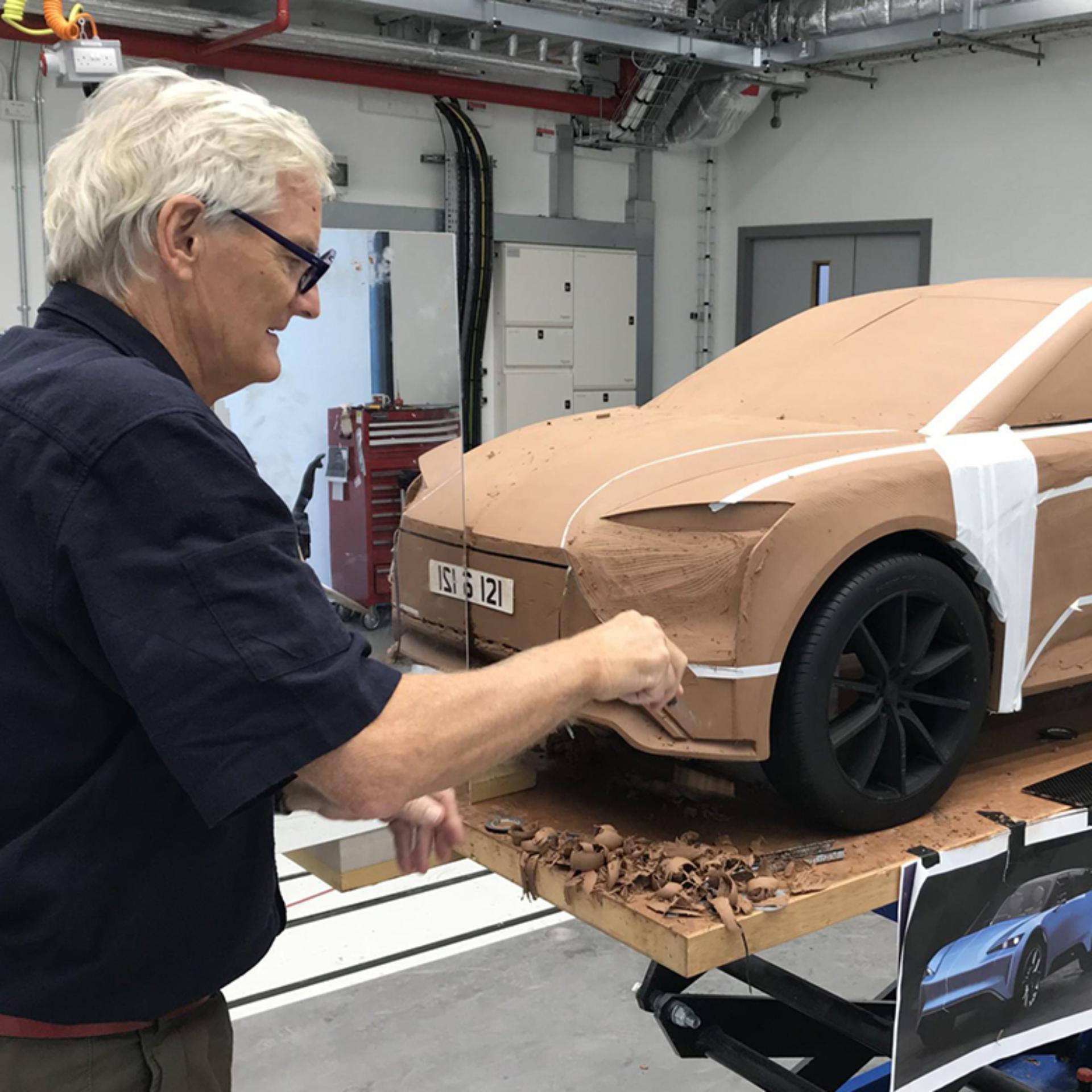 James Dyson modelling the front of the car out of clay